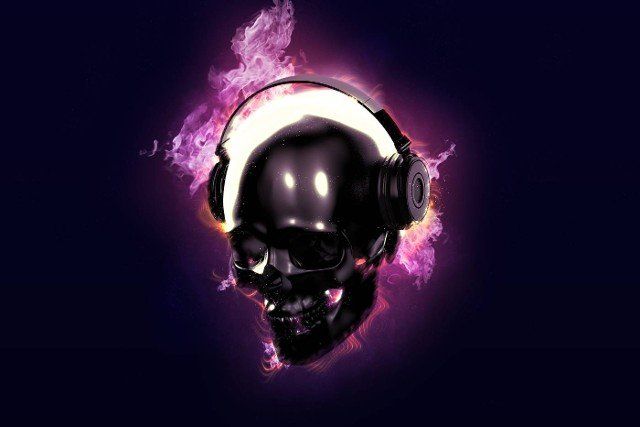 Burning skull with headphones on black background