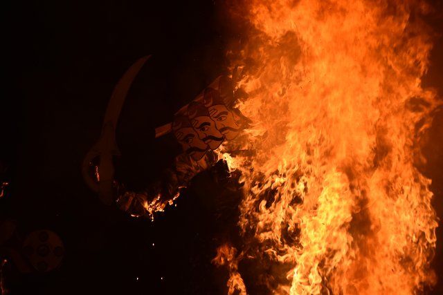 Dussehra, the festival signifying the victory of good over evil, was celebrated with religious fervour and enthusiasm in Kashmir Valley after 4 years. Kashmiri Pandits and Hindus burnt giant effigies of Ravana, Kumbhakarna and Meghnath installed at Sher e Kashmir Cricket ground in Srinagar. (Photo by Mubashir Hassan\/Pacific Press