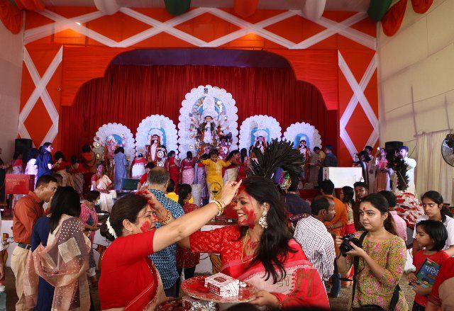 Women Play with Vermilion in front of Goddess Durga Idol on the last day of Durga Puja Festival in New Delhi on 5th october 2022. (Photo by Ranjan Basu\/Pacific Press