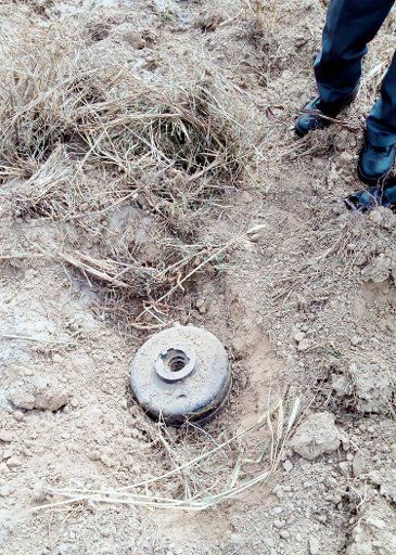 SIALKOT, PAKISTAN, MAR 16: A view of a high intensity Indian made anti-tank landmine, weighing 16 pounds found in Nullah Dek after Bomb Disposal Squad Sialkot defused it saving the area from heavy Disaster, in Sialkot on Tuesday, March 16, 2021. BDS Officials said that this Indian made anti-tank landmine reached here from neighboring Occupied Jammu and Kashmir by floating in recent flash flood waters in Nullah Dek. (Zafar Malik\/PPI Images
