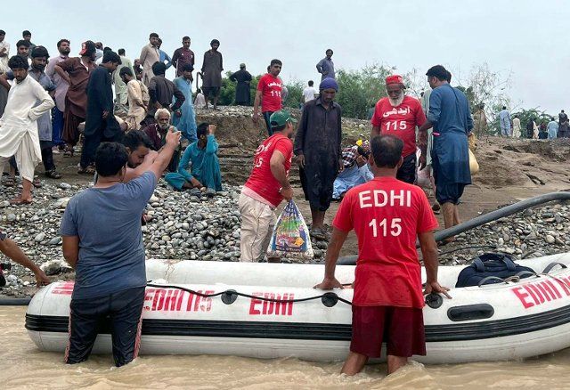 HUB, PAKISTAN, JUL 27: Rescue officials are busy in relief and rescue efforts in various areas to help people affected by flood after heavy downpour of monsoon season, in different areas of Lasbela near Hub on Wednesday, July 27, 2022. The rescue operation of the team of Edhi Marine Services under the supervision of Prahab under the special direction of Faisal Edhi. (Arshad Baloch\/PPI Images