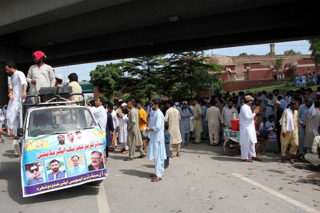 PESHAWAR, PAKISTAN, AUG 23: Members of All Secretaries Association are block road as they are holding protest demonstration for time scale and upgradation, outside Khyber Pakhtunkhwa Assembly in Peshawar on Tuesday, August 23, 2022. (Fahad Pervez\/PPI Images