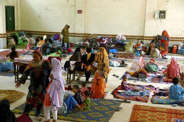 KARACHI, PAKISTAN, AUG 30: Interior Sindh Flood affected people accommodated to rehabilitation at flood affectees relief camp established at a government school located on Sachal Goth area in Karachi on Tuesday, August 30, 2022. (S.Imran Ali\/PPI Images