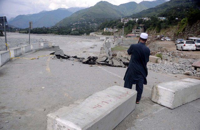 SWAT, PAKISTAN, AUG 30: View of destruction after flood flowed in area, in Swat on Tuesday, August 30, 2022. The damage caused by the devastating floods to road infrastructures and bridges between Kalam and Bahrain as well as in the adjoining hilly areas of Swat is beyond imagination. Most of the hotels were swept away by the floodwaters. The beautiful narrow bazaar seems like a river as the river water is now flowing on the main raid as if there was no road before at all. (Zubair Abbasi\/PPI Images