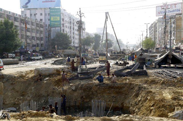 KARACHI, PAKISTAN, DEC 06: Construction works of new development projects is underway under the supervision of local government department, at Gulistan-e-Johar area in Karachi on Tuesday, December 06, 2022. (S.Imran Ali\/PPI Images