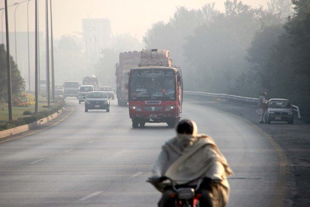 PESHAWAR, PAKISTAN, DEC 06: Deep fog covers the horizon of city creating problems for commuters and which cause increasing cold waves during the winter season, at Northern Bypass road in Peshawar on Tuesday, December 06, 2022. (Fahad Pervez\/PPI Images