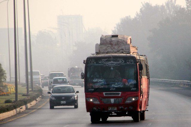 PESHAWAR, PAKISTAN, DEC 06: Deep fog covers the horizon of city creating problems for commuters and which cause increasing cold waves during the winter season, at Northern Bypass road in Peshawar on Tuesday, December 06, 2022. (Fahad Pervez\/PPI Images