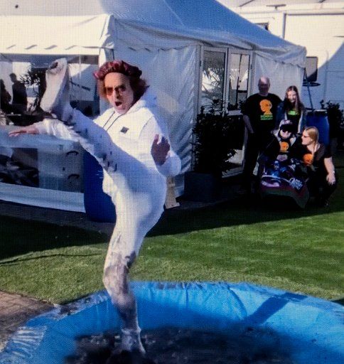 Robert Downey Jr splashes around in a muddy paddling pool to celebrate the new year., Credit:Avalon \/ Avalon