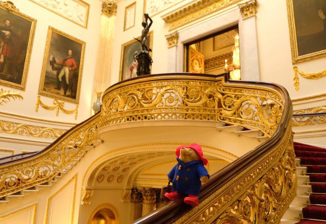 Paddington on the Grand Staircase Paddington Bears who were left as tributes to Queen Elizabeth II enjoy their stay at Buckingham Palace before they are donated to children supported by Barnardo\