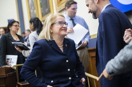 UNITED STATES - FEBRUARY 27: Rep. Sylvia Garcia, D-Texas, talks with an aide during the House Financial Services Committee markup on the Housing Fairness Act of 2020 and many other amendments in Rayburn Building on Thursday, February 27, 2020. (Photo By Tom Williams\/CQ Roll Call)