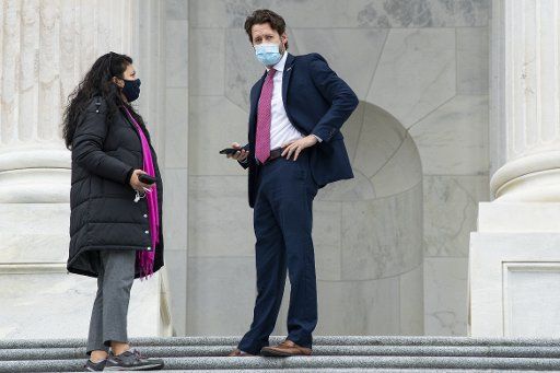 UNITED STATES - DECEMBER 4: Reps. Joe Cunningham, D-S.C., and Rashida Tlaib, D-Mich., are seen on the House steps of the Capitol during votes on Friday, December 4, 2020. (Photo By Tom Williams\/CQ Roll Call