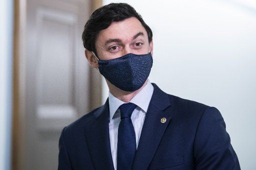 UNITED STATES - FEBRUARY 22: Sen. Jon Ossoff, D-Ga., is seen outside the Senate Judiciary Committee confirmation hearing for Merrick Garland, nominee to be Attorney General, on Monday, February 22, 2021. (Photo By Tom Williams\/CQ Roll Call