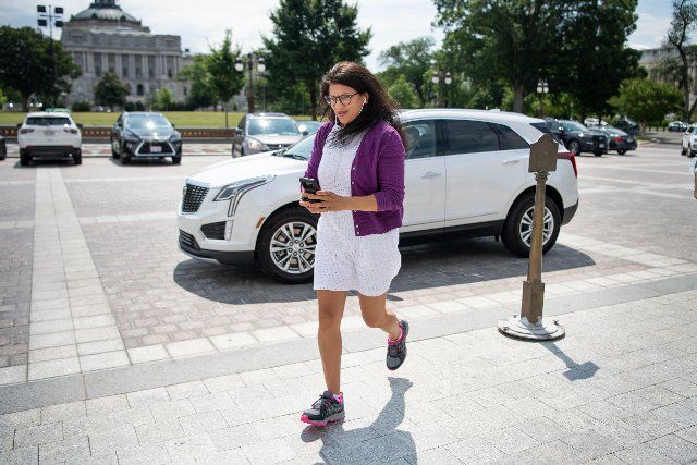 UNITED STATES - JULY 1: Rep. Rashida Tlaib, D-Mich., runs to the House steps for the last votes of the week in Washington on Thursday, July 1, 2021. (Photo by Caroline Brehman\/CQ Roll Call