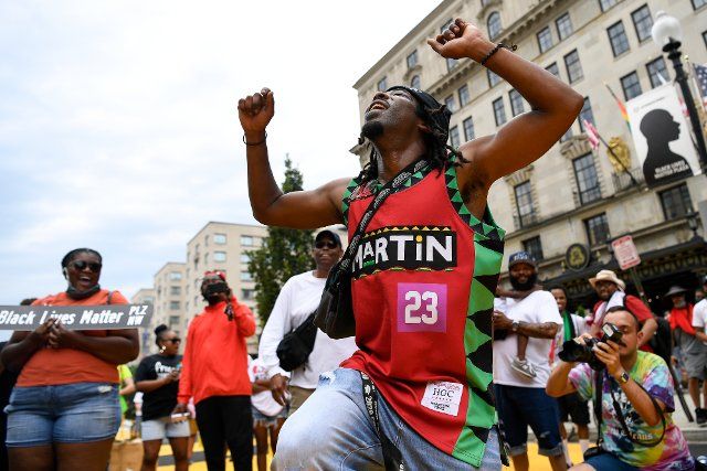 UNITED STATES - June 19: People dance as local Gogo bands play at Black Lives Matter Plaza as part of Juneteenth celebrations in Washington on Saturday, June 19, 2021. (Photo by Caroline Brehman\/CQ Roll Call