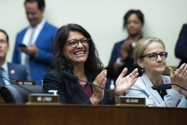 UNITED STATES - JULY 20: Reps. Rashida Tlaib, D-Mich., left, and Madeleine Dean, D-Pa., are seen during the House Financial Services Committee hearing titled ÃBuilding Back A Better, More Equitable Housing Infrastructure for America: Oversight of the Department of Housing and Urban Development,Ã in Rayburn Building on Tuesday, July 20, 2021. HUD Secretary Marcia Fudge testified. (Photo By Tom Williams\/CQ Roll Call
