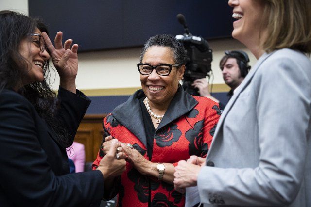 UNITED STATES - JULY 20: HUD Secretary Marcia Fudge, center, and Rep. Rashida Tlaib, D-Mich., talk before the House Financial Services Committee hearing titled ÃBuilding Back A Better, More Equitable Housing Infrastructure for America: Oversight of the Department of Housing and Urban Development,Ã in Rayburn Building on Tuesday, July 20, 2021. (Photo By Tom Williams\/CQ Roll Call