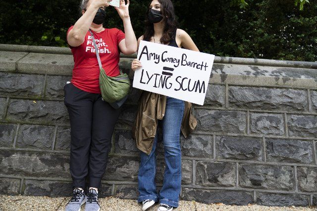 UNITED STATES - MAY 14: Demonstrators are seen on First Street, NE, during a march for abortion rights in response to the Supreme Courtâs leaked draft opinion indicating the Court will overturn Roe v. Wade, on Saturday, May 14, 2022. (Tom Williams\/CQ Roll Call