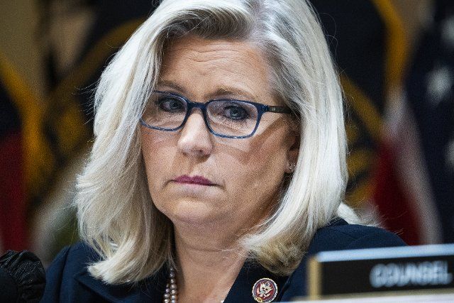 UNITED STATES - JUNE 28: Vice chair Rep. Liz Cheney, R-Wyo., listens to Cassidy Hutchinson, an aide to former White House Chief of Staff Mark Meadows, testify during the Select Committee to Investigate the January 6th Attack on the United States Capitol hearing to present previously unseen material and hear witness testimony in Cannon Building, on Tuesday, June 28, 2022. (Tom Williams\/CQ Roll Call