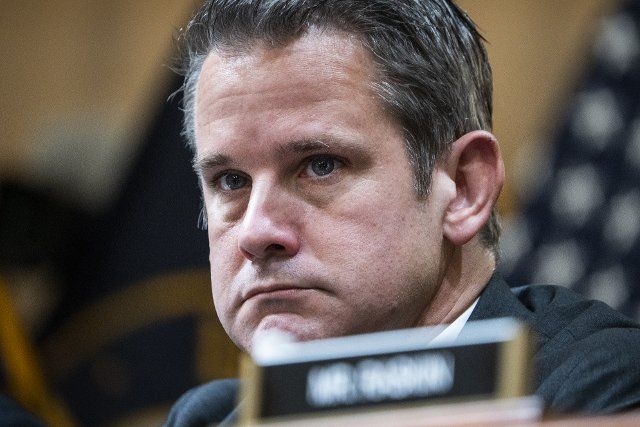 UNITED STATES - JUNE 28: Rep. Adam Kinzinger, R-Ill., listens to Cassidy Hutchinson, an aide to former White House Chief of Staff Mark Meadows, testify during the Select Committee to Investigate the January 6th Attack on the United States Capitol hearing to present previously unseen material and hear witness testimony in Cannon Building, on Tuesday, June 28, 2022. (Tom Williams\/CQ Roll Call