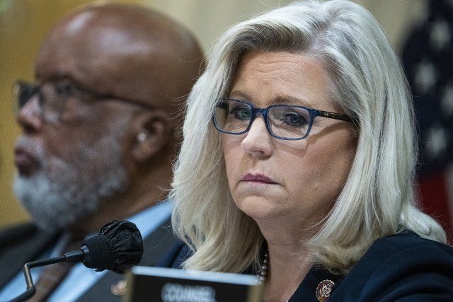 UNITED STATES - JUNE 28: Vice chair Rep. Liz Cheney, R-Wyo., and Chairman Rep. Bennie Thompson, D-Miss., listen to Cassidy Hutchinson, an aide to former White House Chief of Staff Mark Meadows, testify during the Select Committee to Investigate the January 6th Attack on the United States Capitol hearing to present previously unseen material and hear witness testimony in Cannon Building, on Tuesday, June 28, 2022. (Tom Williams\/CQ Roll Call