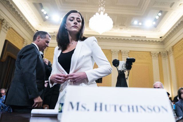 UNITED STATES - JUNE 28: Cassidy Hutchinson, an aide to former White House Chief of Staff Mark Meadows, prepares to testify during the Select Committee to Investigate the January 6th Attack on the United States Capitol hearing to present previously unseen material and hear witness testimony in Cannon Building, on Tuesday, June 28, 2022. (Tom Williams\/CQ Roll Call