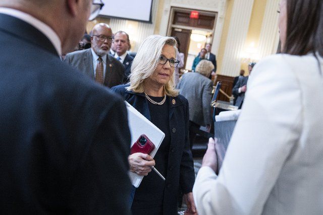 UNITED STATES - JUNE 28: Vice chair Rep. Liz Cheney, R-Wyo., greets Cassidy Hutchinson, an aide to former White House Chief of Staff Mark Meadows, after she testified during the Select Committee to Investigate the January 6th Attack on the United States Capitol hearing to present previously unseen material and hear witness testimony in Cannon Building, on Tuesday, June 28, 2022. (Tom Williams\/CQ Roll Call