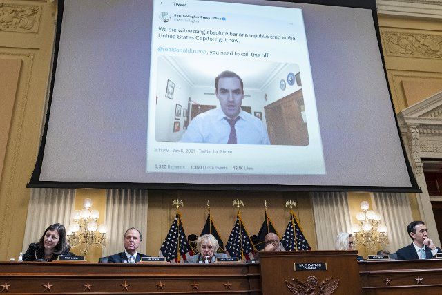 UNITED STATES - JUNE 28: Rep. Mike Gallagher, R-Wis., is seen on a monitor as Cassidy Hutchinson, an aide to former White House Chief of Staff Mark Meadows, testified during the Select Committee to Investigate the January 6th Attack on the United States Capitol hearing to present previously unseen material and hear witness testimony in Cannon Building, on Tuesday, June 28, 2022. Appearing from left are, Reps. Elaine Luria, D-Va., Adam Schiff, D-Calif., Zoe Lofgren, D-Calif., Chairman Bennie Thompson, D-Miss., vice chair Rep. Liz Cheney, R-Wyo., and staff counsel. (Tom Williams\/CQ Roll Call