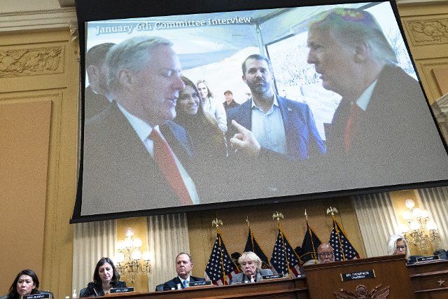 UNITED STATES - JUNE 28: Former White House Chief of Staff Mark Meadows, Kimberly Guilfoyle, Donald Trump Jr., and former President Donald Trump, are seen on a monitor as Meadows aide Cassidy Hutchinson, testified during the Select Committee to Investigate the January 6th Attack on the United States Capitol hearing to present previously unseen material and hear witness testimony in Cannon Building, on Tuesday, June 28, 2022. Appearing from left are, Reps. Stephanie Murphy, D-Fla., Elaine Luria, D-Va., Adam Schiff, D-Calif., Zoe Lofgren, D-Calif., Chairman Bennie Thompson, D-Miss., and vice chair Rep. Liz Cheney, R-Wyo.(Tom Williams\/CQ Roll Call