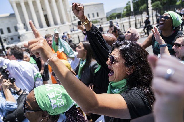 UNITED STATES - JULY 19: Rep. Rashida Tlaib, D-Mich., attends a sit-it outside of the Supreme Court with members of Congress to protest the decision to overturn Roe v. Wade on Tuesday, July 19, 2022. (Tom Williams\/CQ Roll Call