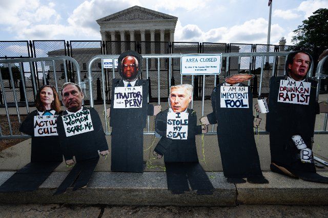 UNITED STATES - JUNE 24: Cardboard cutouts of the conservative Supreme Court justices were propped up by pro-choice activists in front of the Supreme Court before the Dobbs v Jackson Womenâs Health Organization decision overturning Roe v Wade was handed down at the U.S. Supreme Court on Friday, June 24, 2022. (Bill Clark\/CQ Roll Call