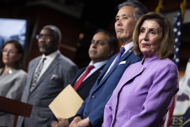 UNITED STATES - AUGUST 10: From right, Speaker of the House Nancy Pelosi, D-Calif., Reps. Mark Takano, D-Calif., Raja Krishnamoorthi, D-Ill., Gregory Meeks, D-N.Y., and Suzan DelBene, D-Wash., members of the Congressional delegation who traveled to Taiwan and the Indo-Pacific region, conduct a news conference on their trip, in the Capitol Visitor Center on Wednesday, August 10, 2022. (Tom Williams\/CQ Roll Call