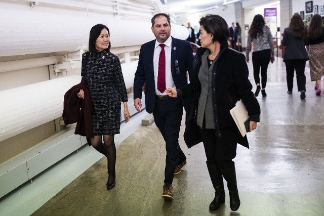 UNITED STATES - NOVEMBER 30: From left, Reps. Michelle Steel, R-Calif., Mike Garcia, R-Calif., and Young Kim, R-Calif., are seen in the Cannon tunnel during a vote on Wednesday, November 30, 2022. (Tom Williams\/CQ Roll Call