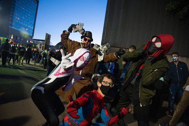 Fans of Spider Man movies and universe fight a man dressed as antagonist Dr. Octopus during the fourth day of the SOFA (Salon del Ocio y la Fantasia) 2021, a fair aimed to the geek audience in Colombia that mixes Cosplay, gaming, superhero and movie 