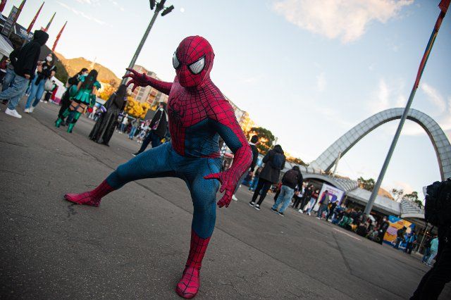 A fan of Marvel superhero Spider Man poses for a photo during the fourth day of the SOFA (Salon del Ocio y la Fantasia) 2021, a fair aimed to the geek audience in Colombia that mixes Cosplay, gaming, superhero and movie fans from across Colombia, in 