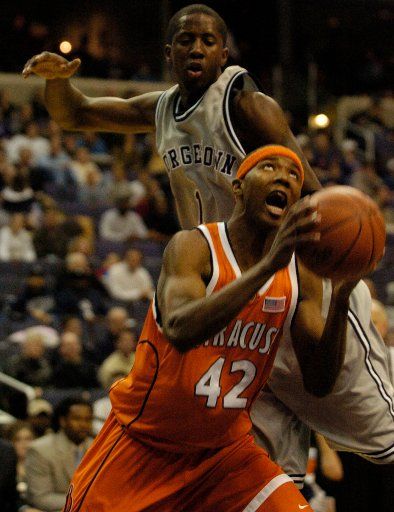 Louie McCroskey of Syracuse University scores against host Georgetown University on Feb. 21 2004 at the MCI Center in Washington D.C. (UPI Photo\/Mark Goldman)