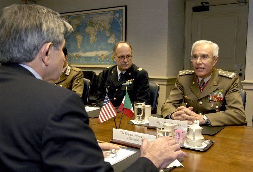 Chief of the Italian Defense Staff Gen. Rolando Mosca Moschini (R) meets with U.S. Deputy Secretary of Defense Paul Wolfowitz in the Pentagon on Dec. 4 2003.  Moschini and Wolfowitz along with a small number of their senior advisors are meeting to...