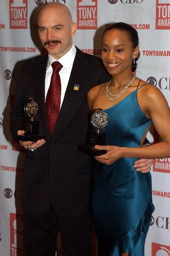 Actor Michael Cerveris winner for Best Featured Actor in a Musical "Assassins" and Anika Noni Rose winner for Best Featured Actress in a Musical "Caroline Or Change" pose at the 2004 Tony Award ceremonies on June 6 2004 in New York. (UPI Photo\/Ezio...