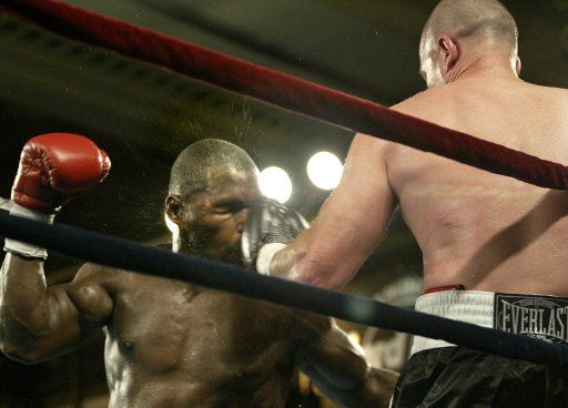 Dale Brown hits Robert Daniels off the ropes en route to taking a split decision and the vacant title in NABF cruiserweight action at the Seminole Hard Rock Hotel and Casino in Hollywod  Florida on June 8 2004.   (UPI Photo\/Michael Bush)