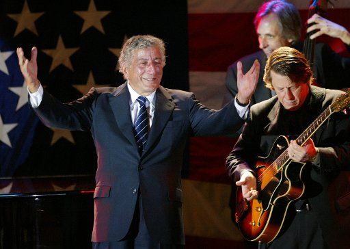 Singer Tony Bennett sings left and his band preform  for democratic presidential nominee U.S. Senator John Kerry  at a fundraiser  in Santa Monica CA on August 26 2004. (UPI Photo\/Francis Specker)