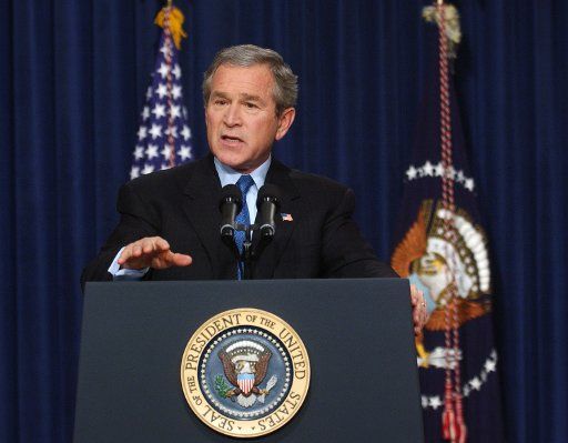 President George W. Bush speaks with members of the White House Press Corps during a final news conference of 2004 on December 20 2004 in Washington.  Bush discussed domestic issues like Medicare and international issues like the war in Iraq and the...
