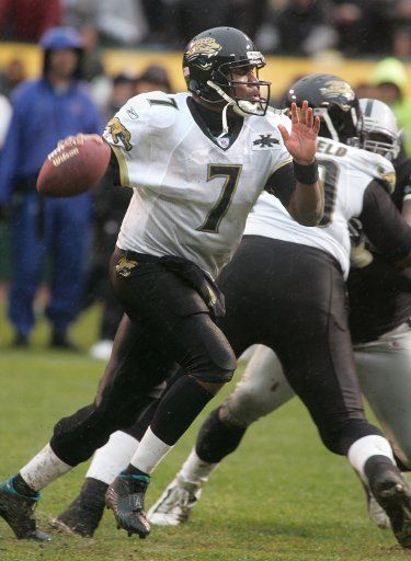 Jacksonville Jaguars QB Byron Leftwich scrambles while looking for a receiver against the Oakland Raiders at the Network Associates Coliseum in Oakland CA on January 2 2005. The Jaguars defeated the Raiders 13-6.   (UPI Photo\/Terry Schmitt)
