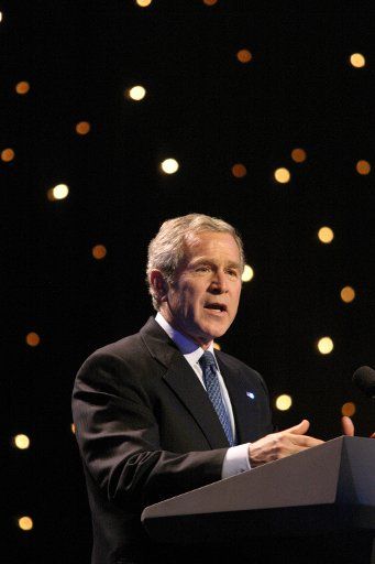 President George W. Bush speaks at the "Saluting Those Who Serve" inaugural event on January 18 2005  at the MCI Center in Washington DC.  (UPI Photo\/Martin H. Simon\/Pool)