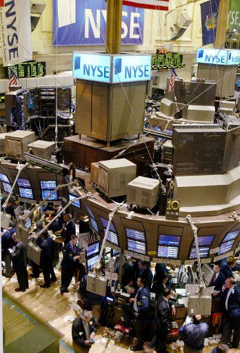 Specialists conduct their business on the floor of the New York Stock Exchange in New York City on February 3 2005.(UPI Photo\/Monika Graff)