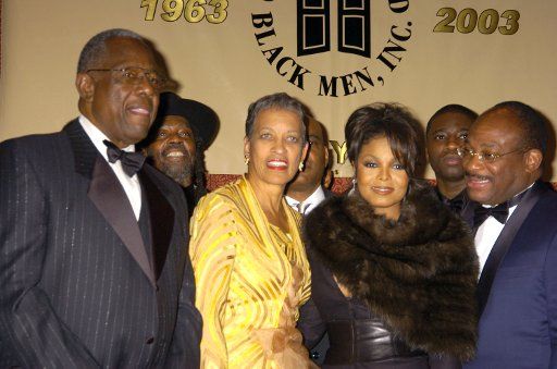 The Honorees Hank Aaron Dr Johnnetta B. Cole Janet Jackson and Willie E Gary pose for photographers at the One Hundred Black Men Inc. gala honoring Hank Aaron Janet Jackson Dr Johnnetta Cole and Willie E Gary on November 11 2004 at the New York...