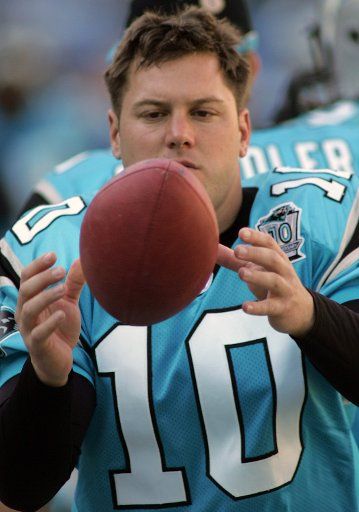 Carolina Panthers punter Todd Sauerbrun (10) focuses on preparing to punt as the Panthers hosted rival Tampa Bay Buccaneers at Bank of America Stadium in Charlotte NC on November 28 2004.    (UPI Photo\/Bob Carey) 