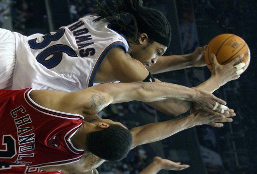 Etan Thomas (36) of the Washington Wizards shoots against Tyson Chandler (3) of the Chicago Bulls in the third quarter of NBA playoff action at the MCI Center in Washington DC on April 30 2005. The Wizards defeated the Bulls 117-99. (UPI Photo\/Kevin...
