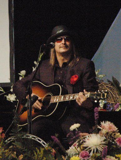 Kid Rock performs "I Saw the Light" during the funeral for country music legend Merle Kilgore on Tuesday February 15 2005 at the Ryman Auditorium in Nashville Tennessee.  (UPI Photo\/Alan L. Mayor\/POOL)