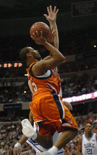 T.J. Bannister of the University of Virginia Cavaliers  scores in the first half in a game against the Duke University Blue Devils in the quarter finals of the ACC Tournament on March 11 2005 at the MCI Center in  Washington D.C. (UPI Photo\/Mark...