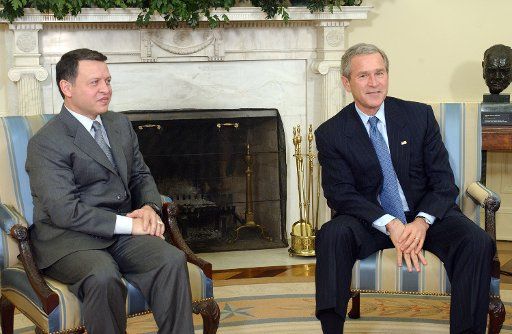 King Abdullah II of Jordan left meets with U.S. President George W. Bush in the Oval Office of the White House on March 15 2005. (UPI Photo\/Roger L. Wollenberg)   (UPI Photo\/Roger L. Wollenberg)