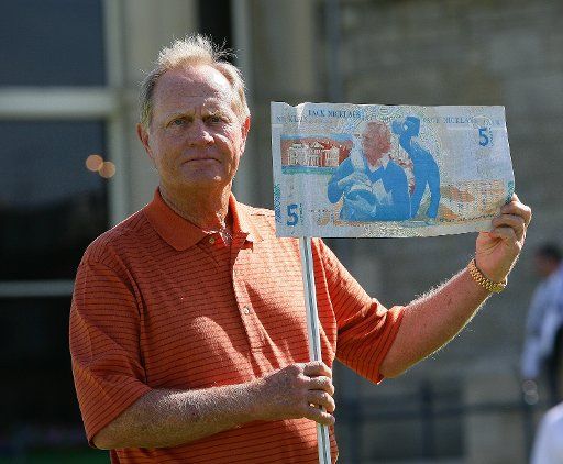 American golfer Jack Nicklaus holds an enlarged five pound note after the Royal Bank of Scotland decided to print the note in his honour at the 2005 British Open golf championship on the old course of St.Andrews on Tuesday 12 July 2005.(UPI Photo\/HUGO...